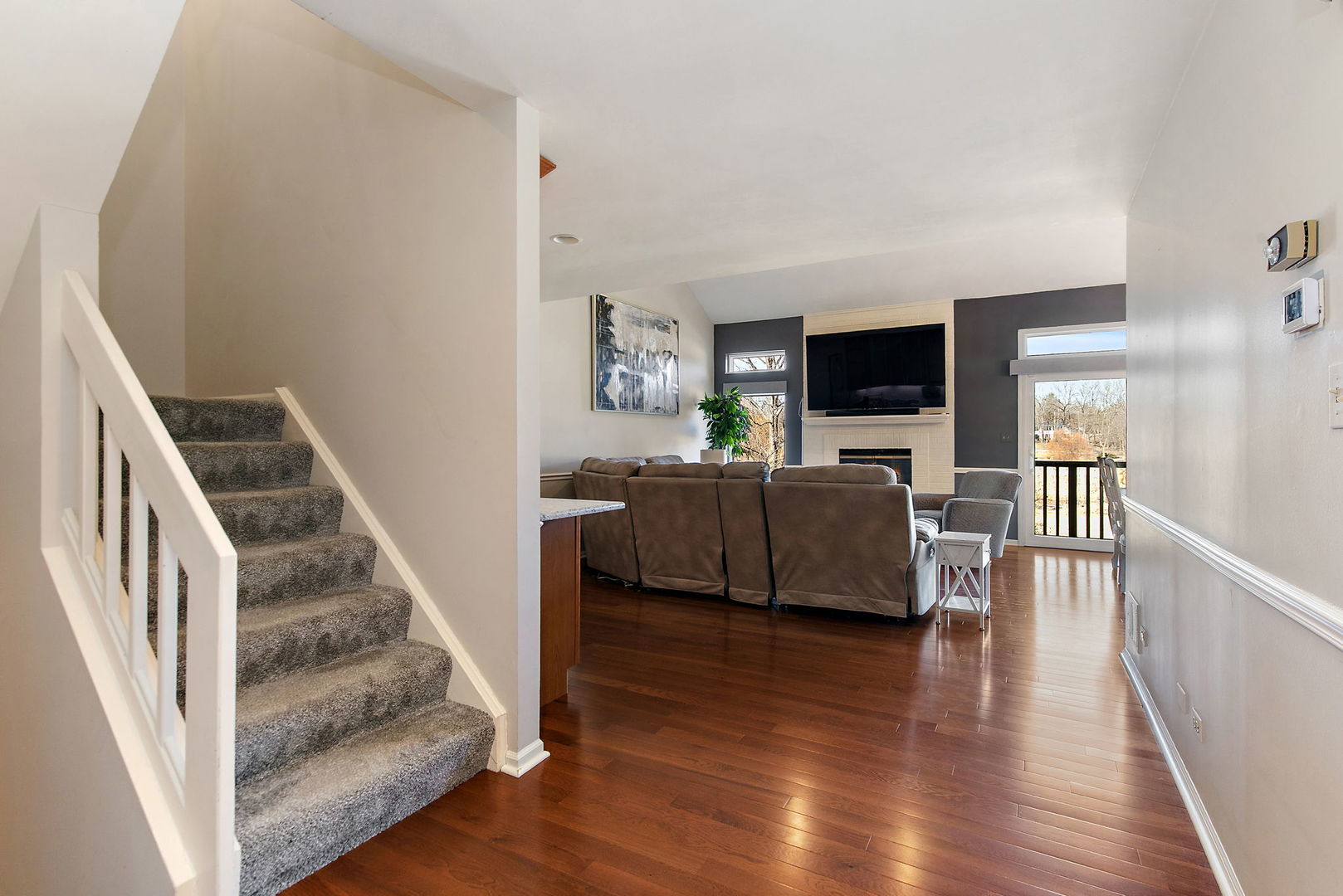 814 Oak Hill Road Lake Barrington, IL 60010 - Photo 18 of 59 a living room with furniture and a flat screen tv