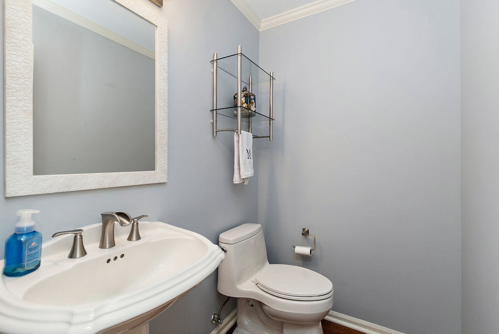 814 Oak Hill Road Lake Barrington, IL 60010 - Photo 19 of 59 a bathroom with a sink toilet and mirror