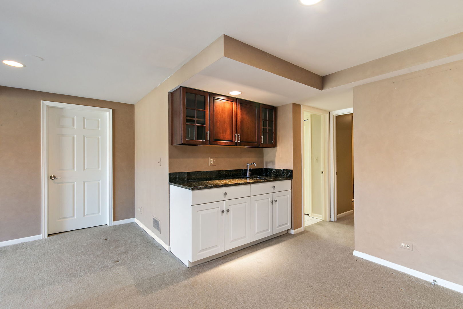 814 Oak Hill Road Lake Barrington, IL 60010 - Photo 31 of 59 a kitchen with granite countertop white cabinets and stainless steel appliances