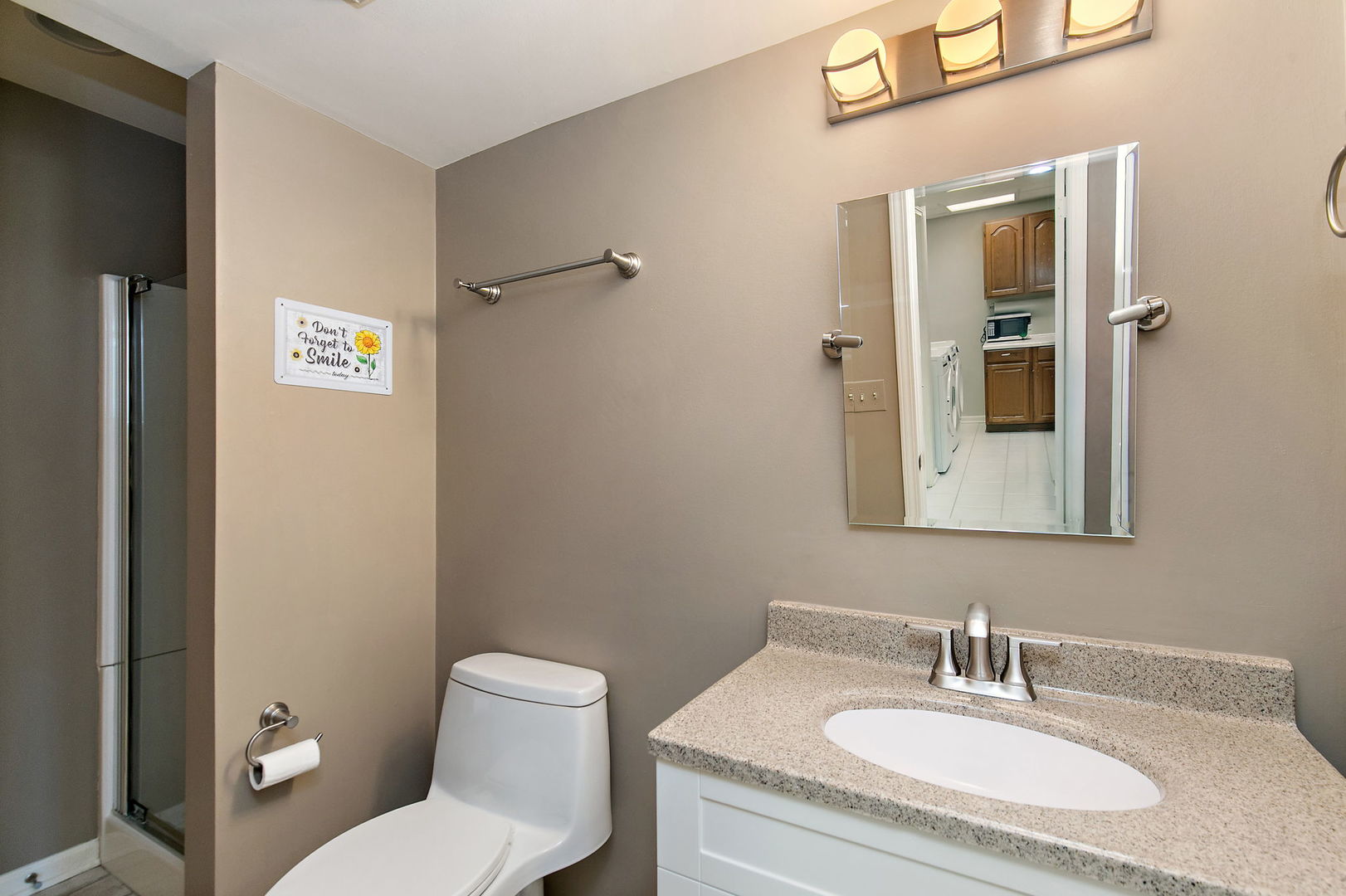 814 Oak Hill Road Lake Barrington, IL 60010 - Photo 32 of 59 a bathroom with a granite countertop toilet sink and mirror