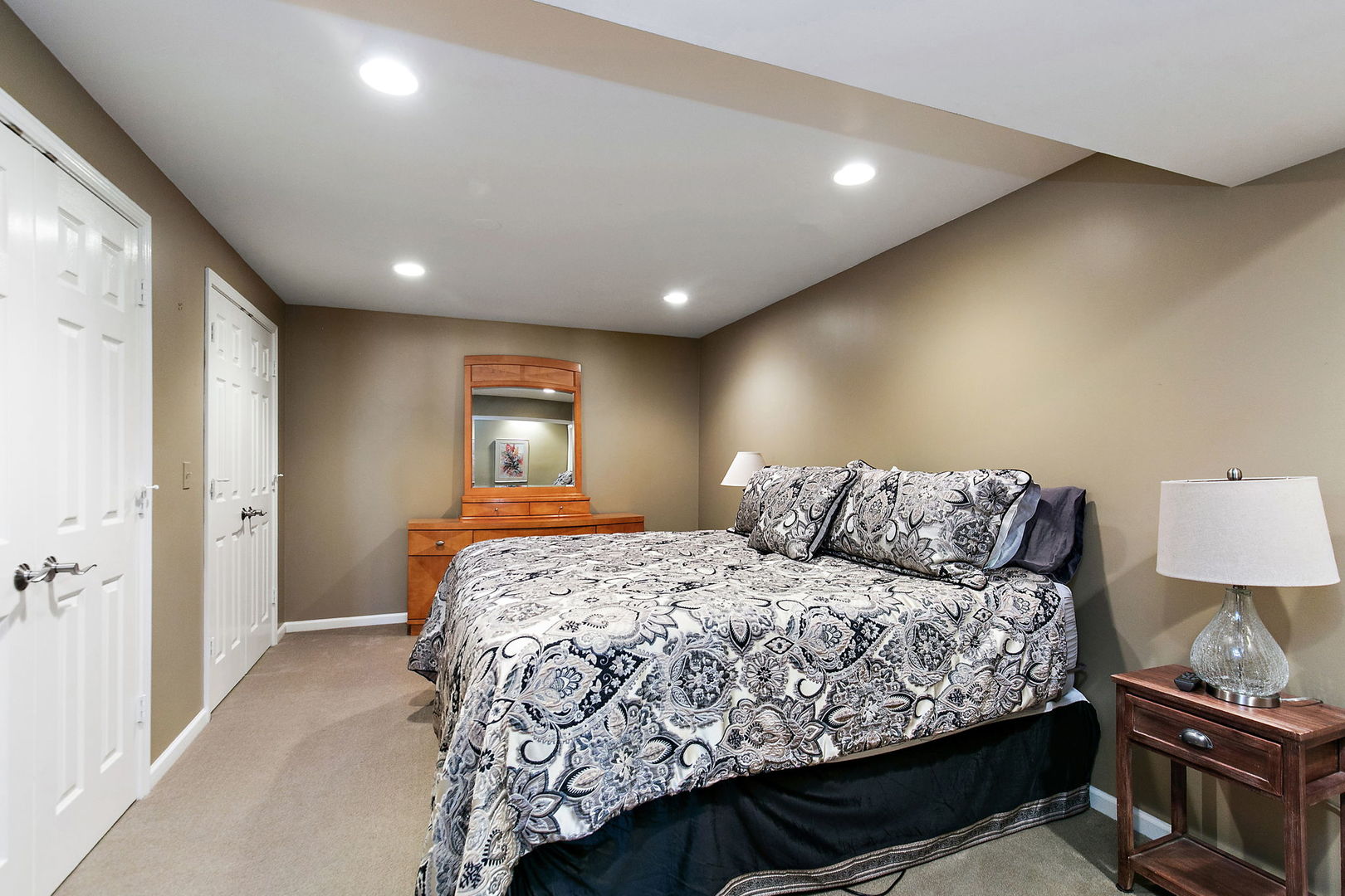 814 Oak Hill Road Lake Barrington, IL 60010 - Photo 33 of 59 a bedroom with a large bed and wooden floor