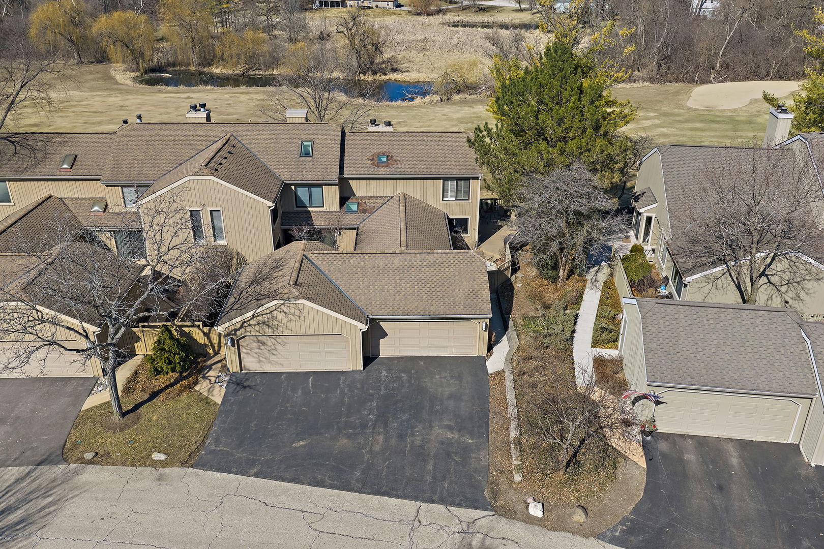 814 Oak Hill Road Lake Barrington, IL 60010 - Photo 39 of 59 an aerial view of a house with a yard and large tree