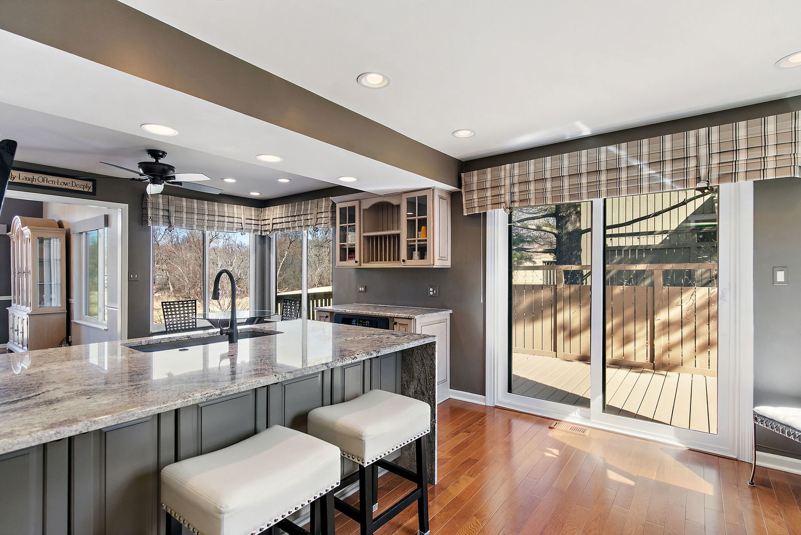 814 Oak Hill Road Lake Barrington, IL 60010 - Photo 5 of 59 a dining hall with stainless steel appliances granite countertop a stove and a sink