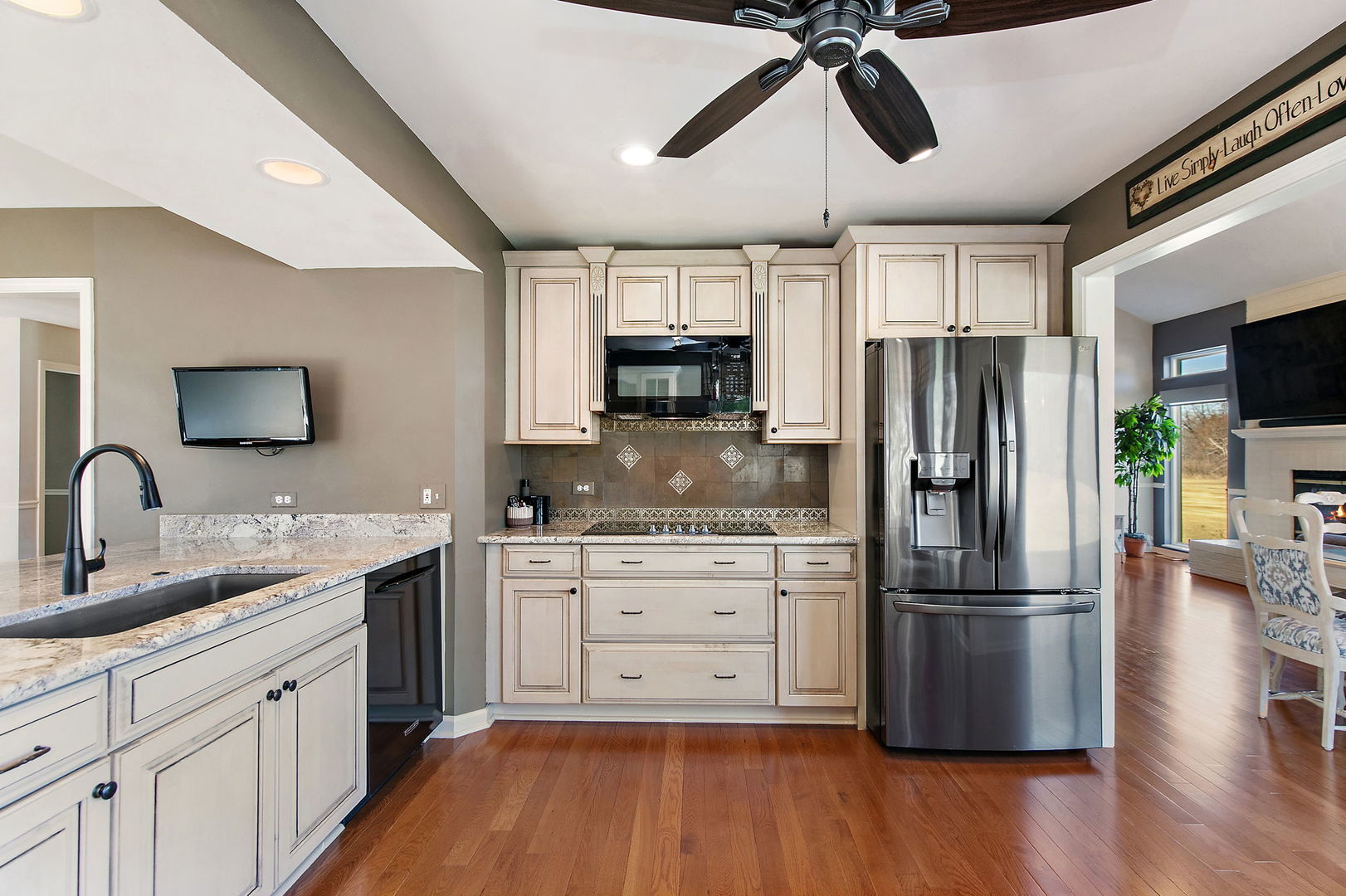 814 Oak Hill Road Lake Barrington, IL 60010 - Photo 7 of 59 a kitchen with stainless steel appliances a refrigerator sink and microwave