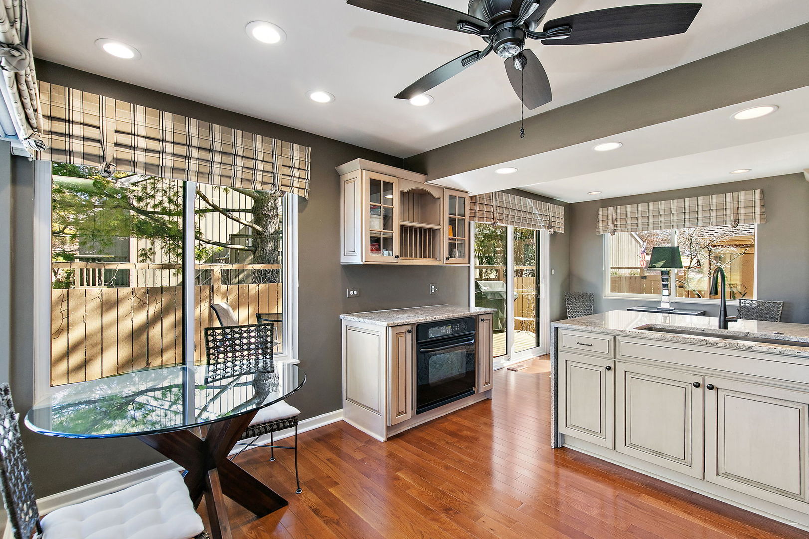 814 Oak Hill Road Lake Barrington, IL 60010 - Photo 8 of 59 a kitchen with kitchen island granite countertop a stove and a sink