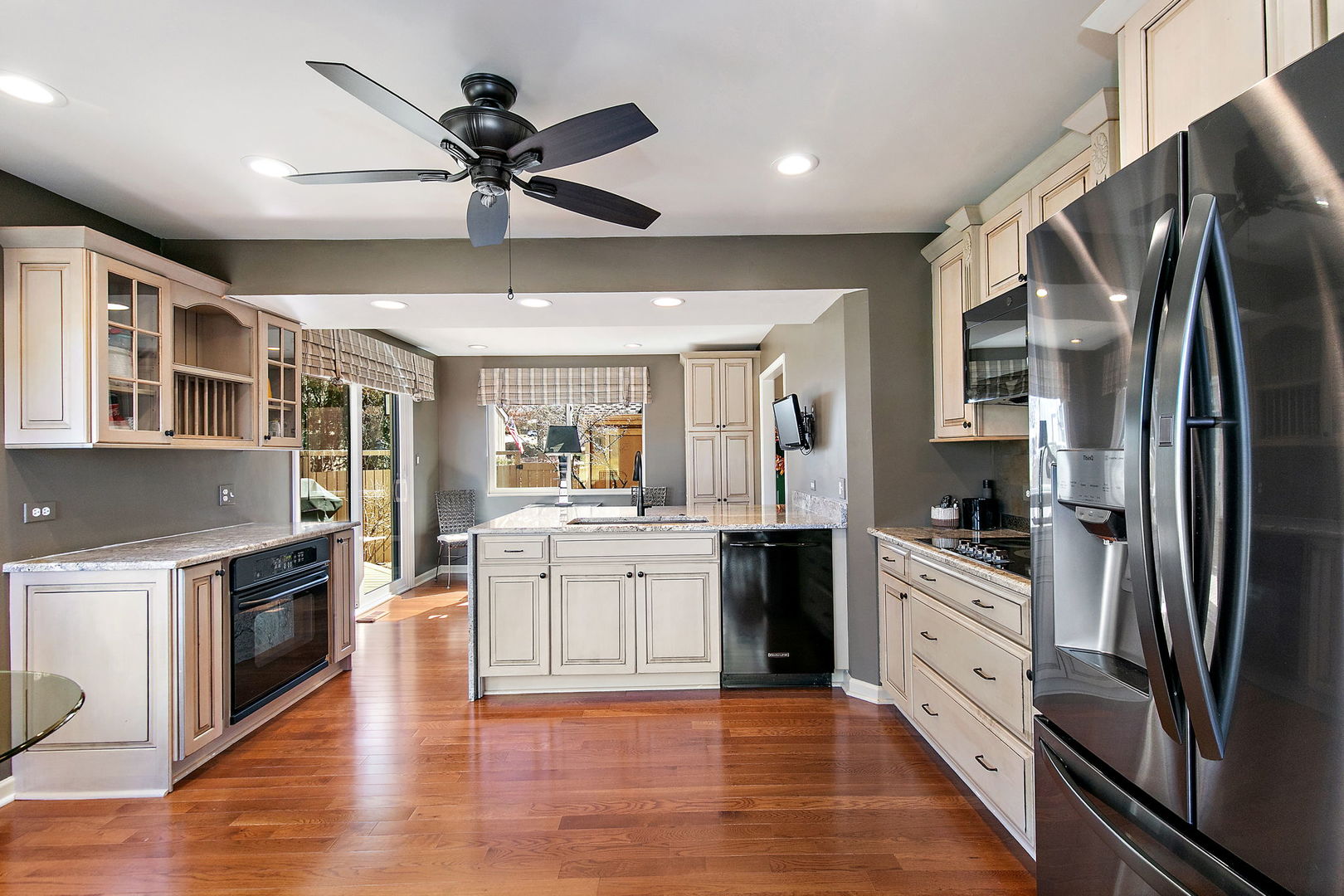 814 Oak Hill Road Lake Barrington, IL 60010 - Photo 9 of 59 a kitchen with stainless steel appliances granite countertop a stove refrigerator and a sink