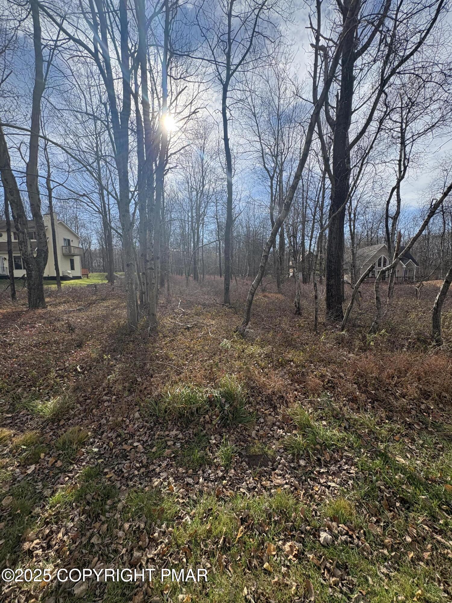 Lot 18 Boulder Road Blakeslee, PA 18610 - Photo 2 of 3 a backyard of a house with lots of green space