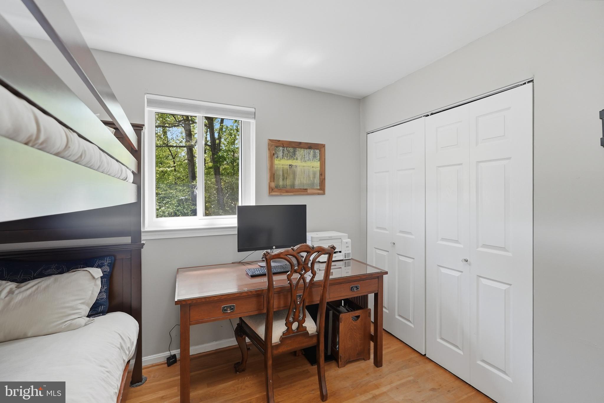7006 Barnack Drive Springfield, VA 22152 - Photo 21 of 56 a view of a workspace with furniture and a window