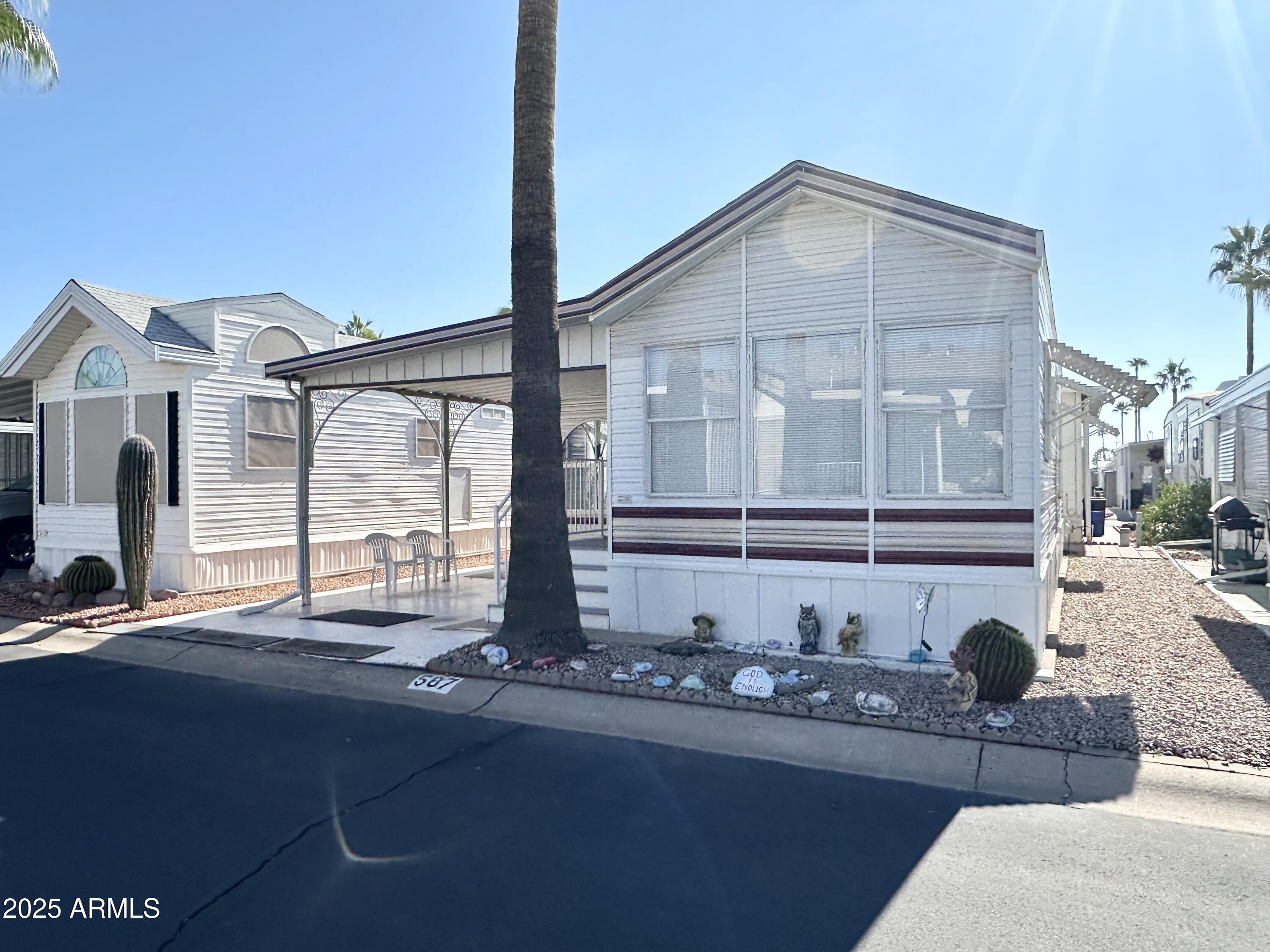 587 South Jasper Drive, Unit 587 Apache Junction, AZ 85119 - Photo 2 of 65 GREAT RESORT LOCATION