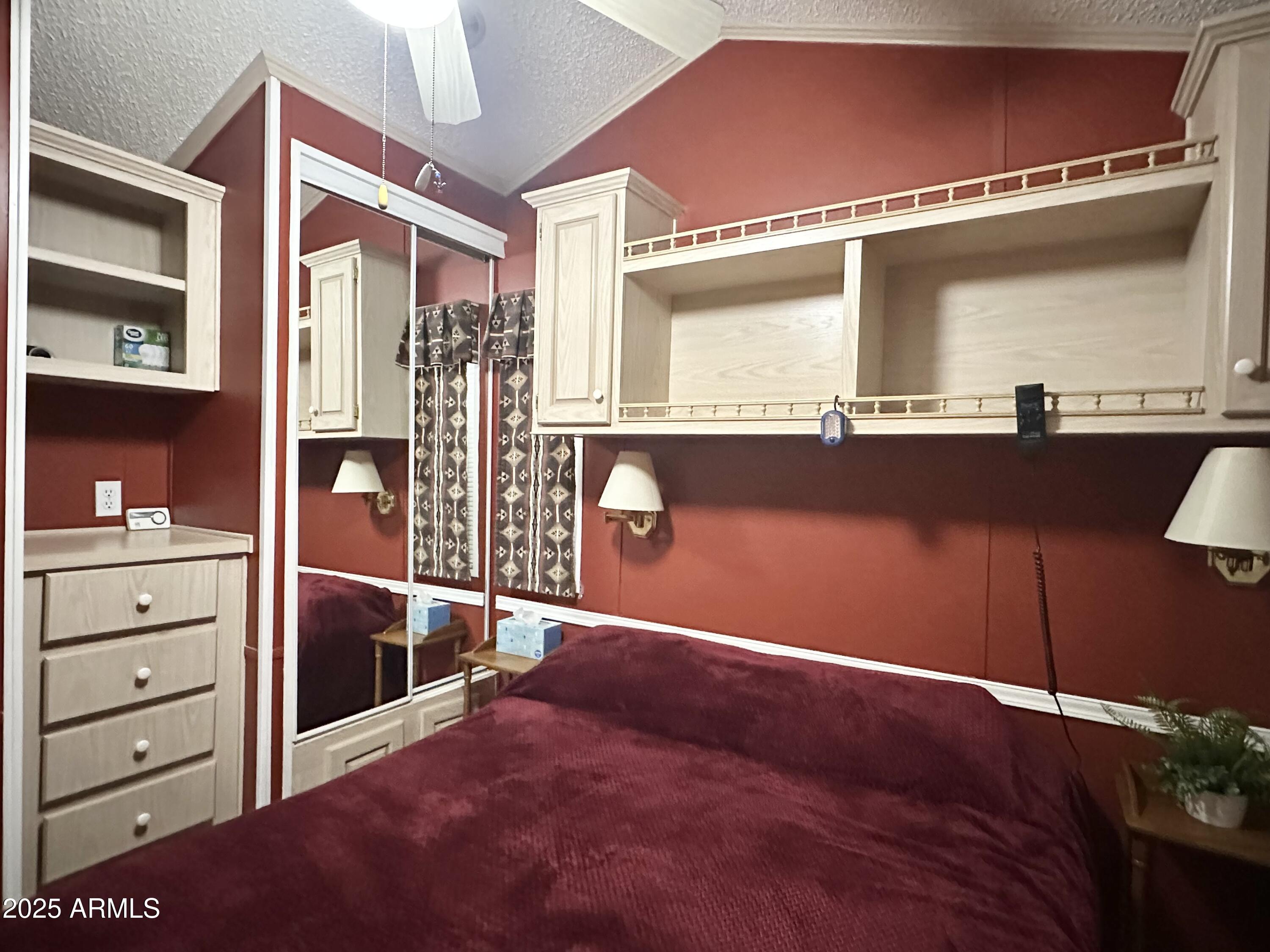 587 South Jasper Drive, Unit 587 Apache Junction, AZ 85119 - Photo 33 of 65 ABOVE BED STORAGE