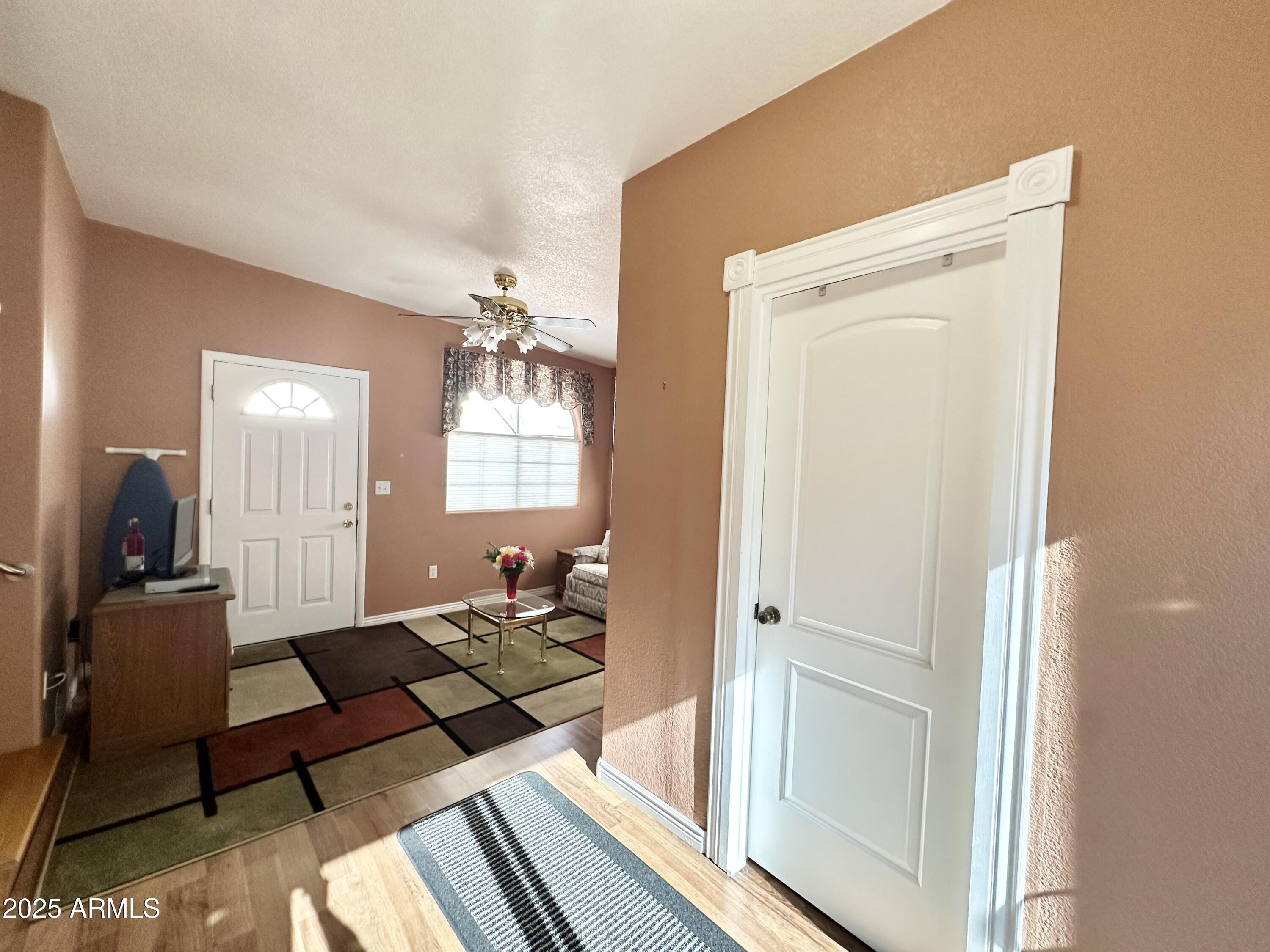 587 South Jasper Drive, Unit 587 Apache Junction, AZ 85119 - Photo 47 of 65 AZ ROOM BATHROOM ENTRY