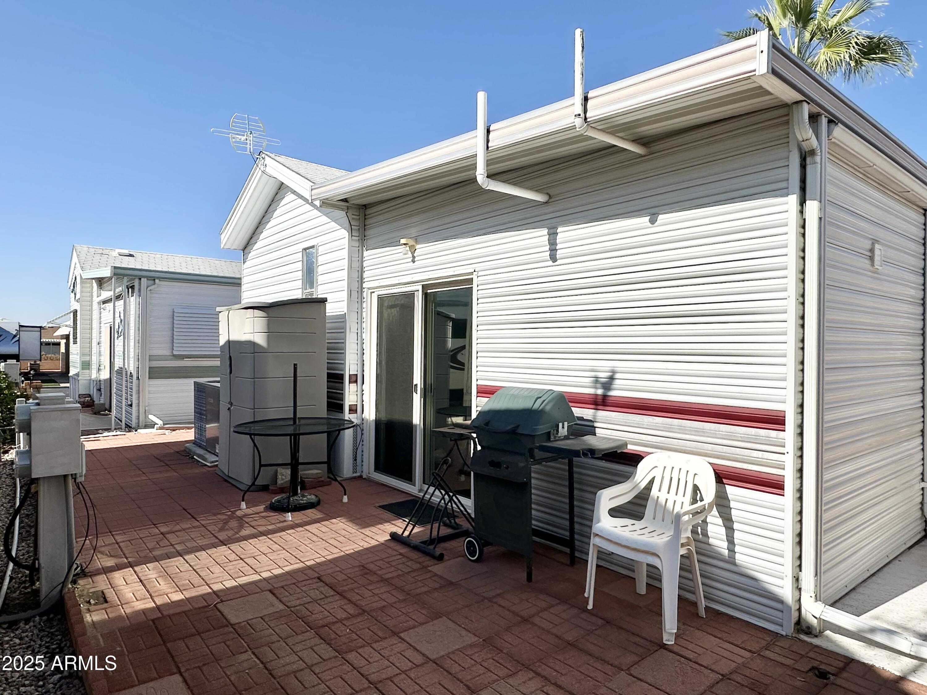 587 South Jasper Drive, Unit 587 Apache Junction, AZ 85119 - Photo 56 of 65 GRAND BACK PATIO