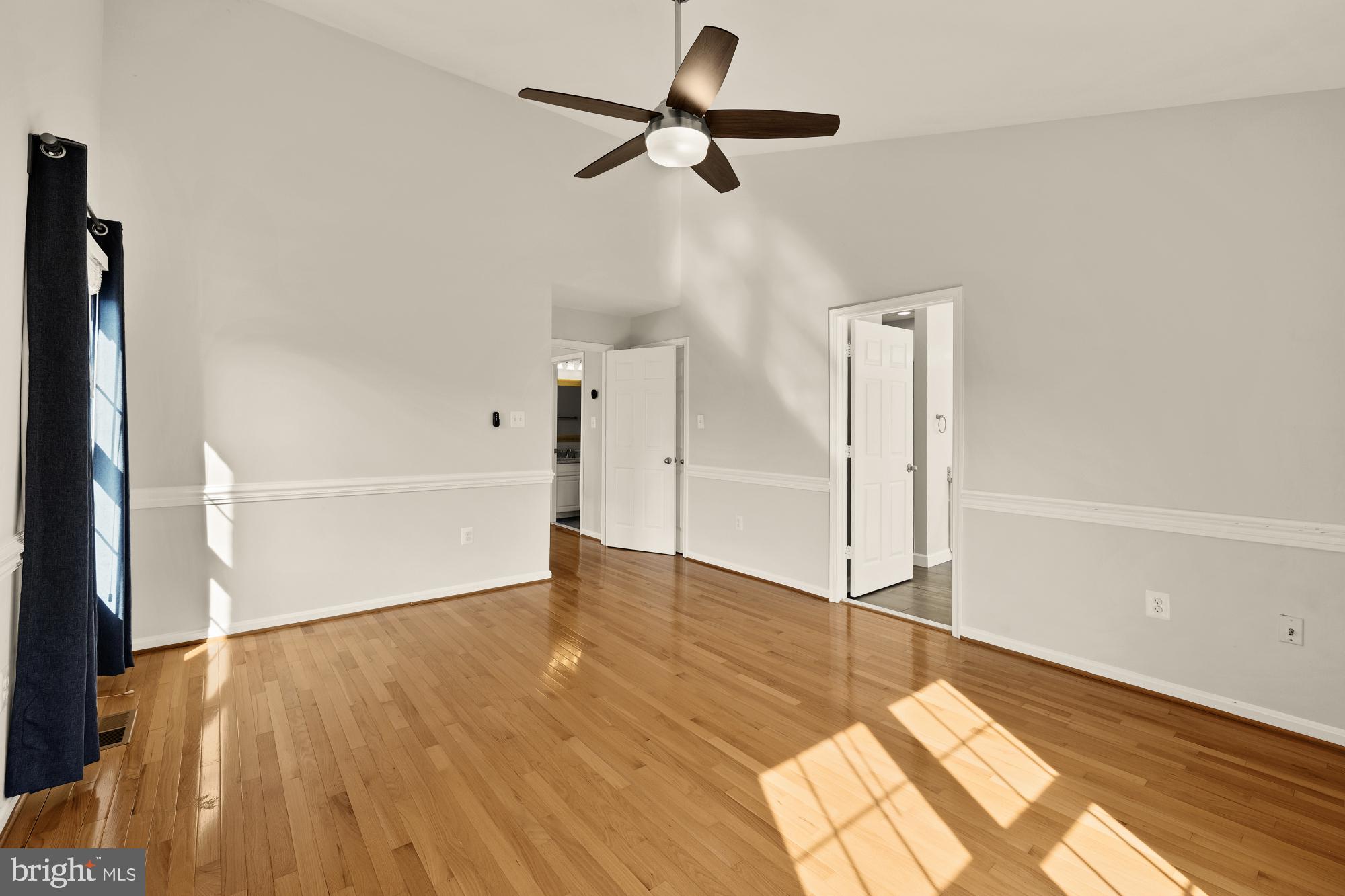 3015 Fallswood Glen Court Falls Church, VA 22044 - Photo 20 of 36 a view of empty room with wooden floor and fan
