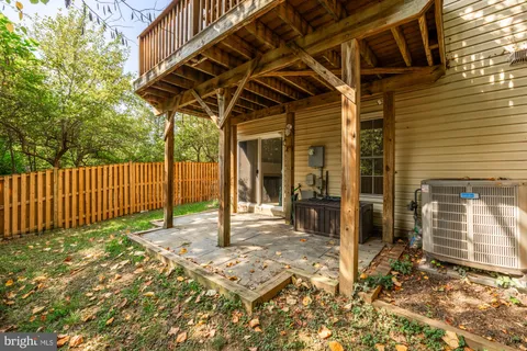a view of outdoor space with wooden fence