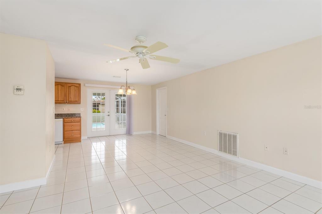 703 Spring Lake Boulevard Northwest Port Charlotte, FL 33952 - Photo 4 of 36 a view of an empty room with a window