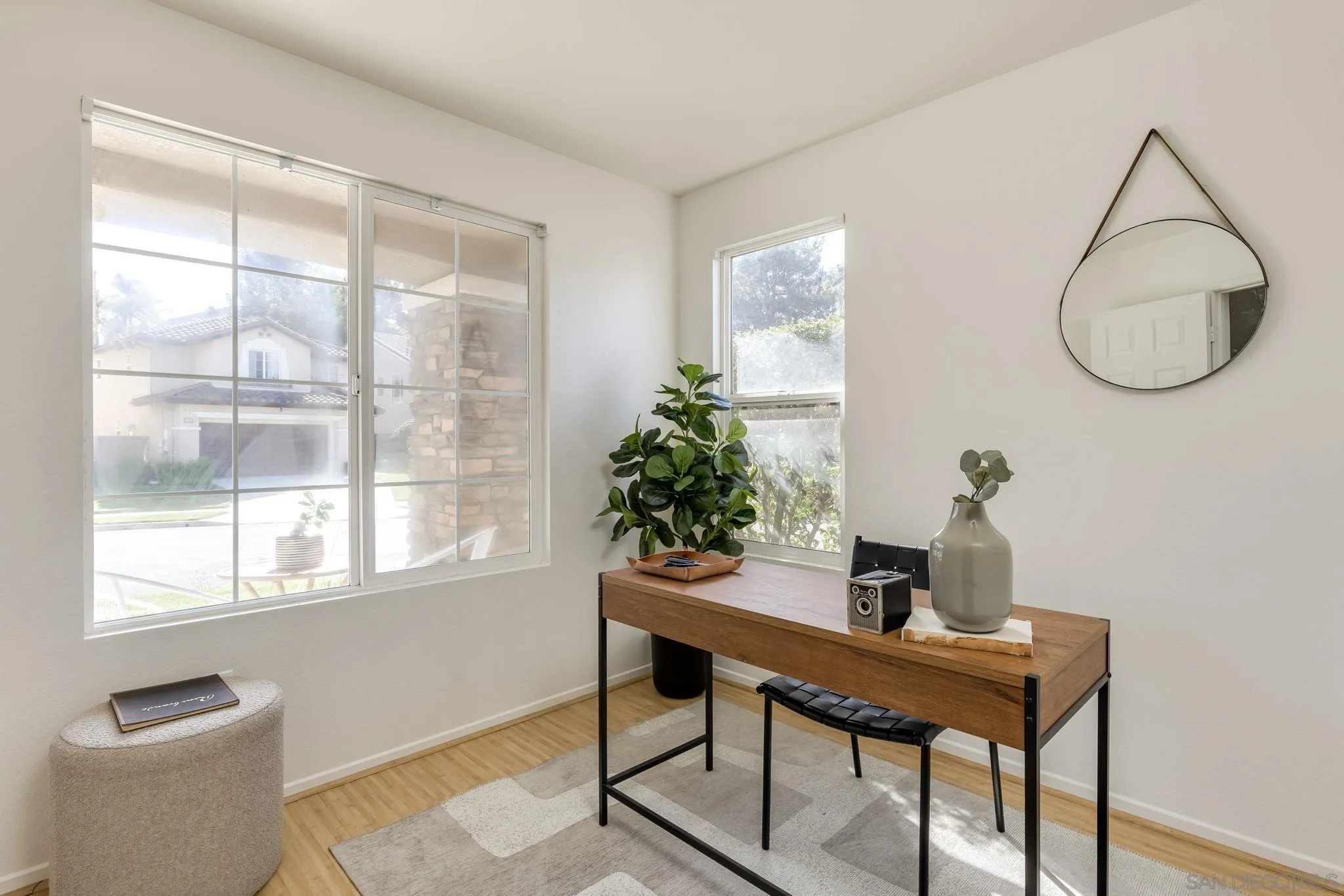 1589 Laurel Circle Vista, CA 92081 - Photo 11 of 31 a workspace with furniture and window