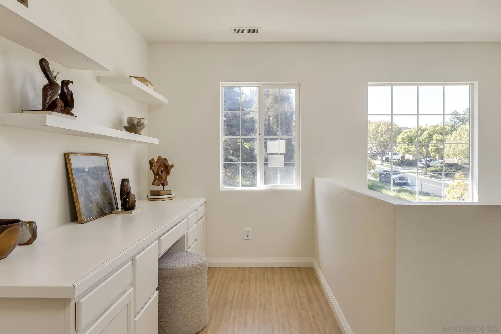 1589 Laurel Circle Vista, CA 92081 - Photo 13 of 31 a kitchen with a sink a window and cabinets