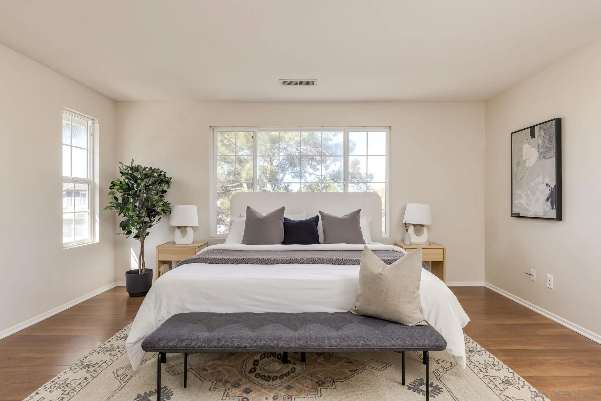 1589 Laurel Circle Vista, CA 92081 - Photo 14 of 31 a living room with furniture and a potted plant