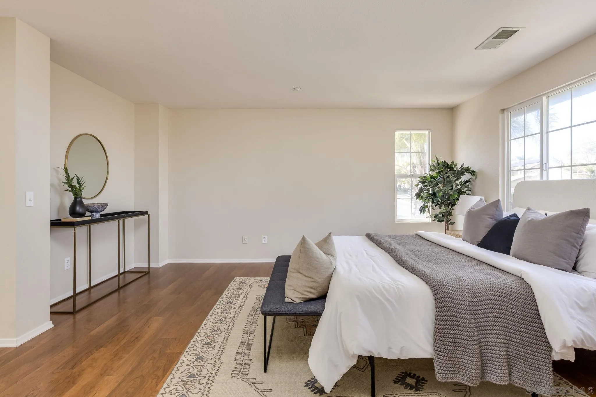 1589 Laurel Circle Vista, CA 92081 - Photo 15 of 31 a bedroom with a bed and a dresser