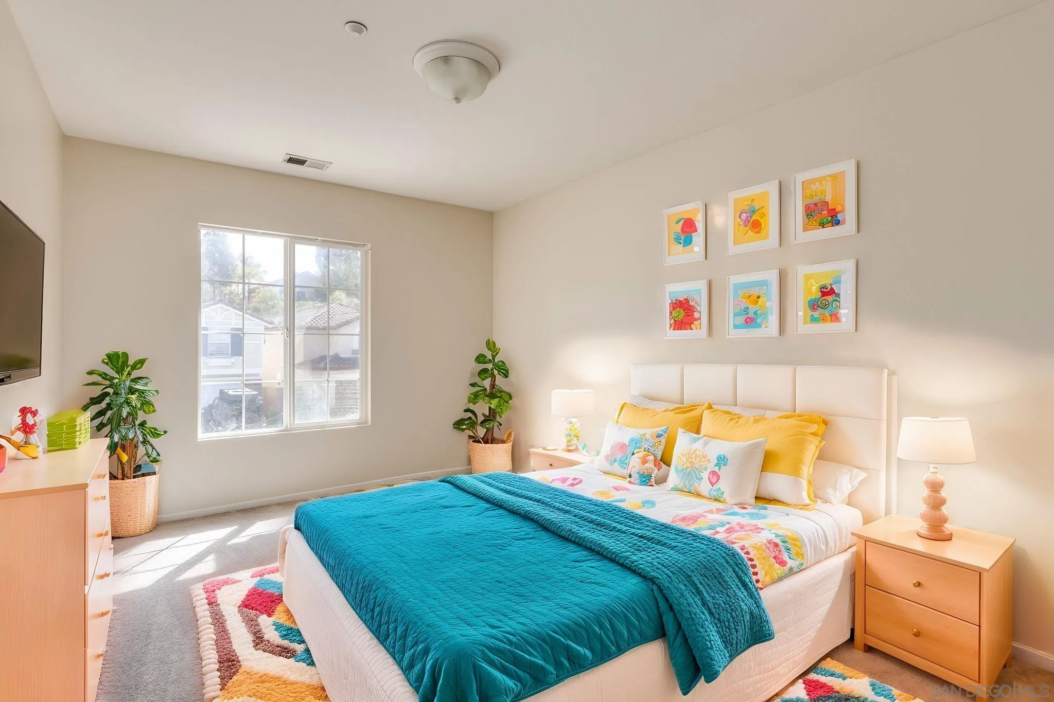 1589 Laurel Circle Vista, CA 92081 - Photo 21 of 31 a bedroom with a bed and a painting on the wall