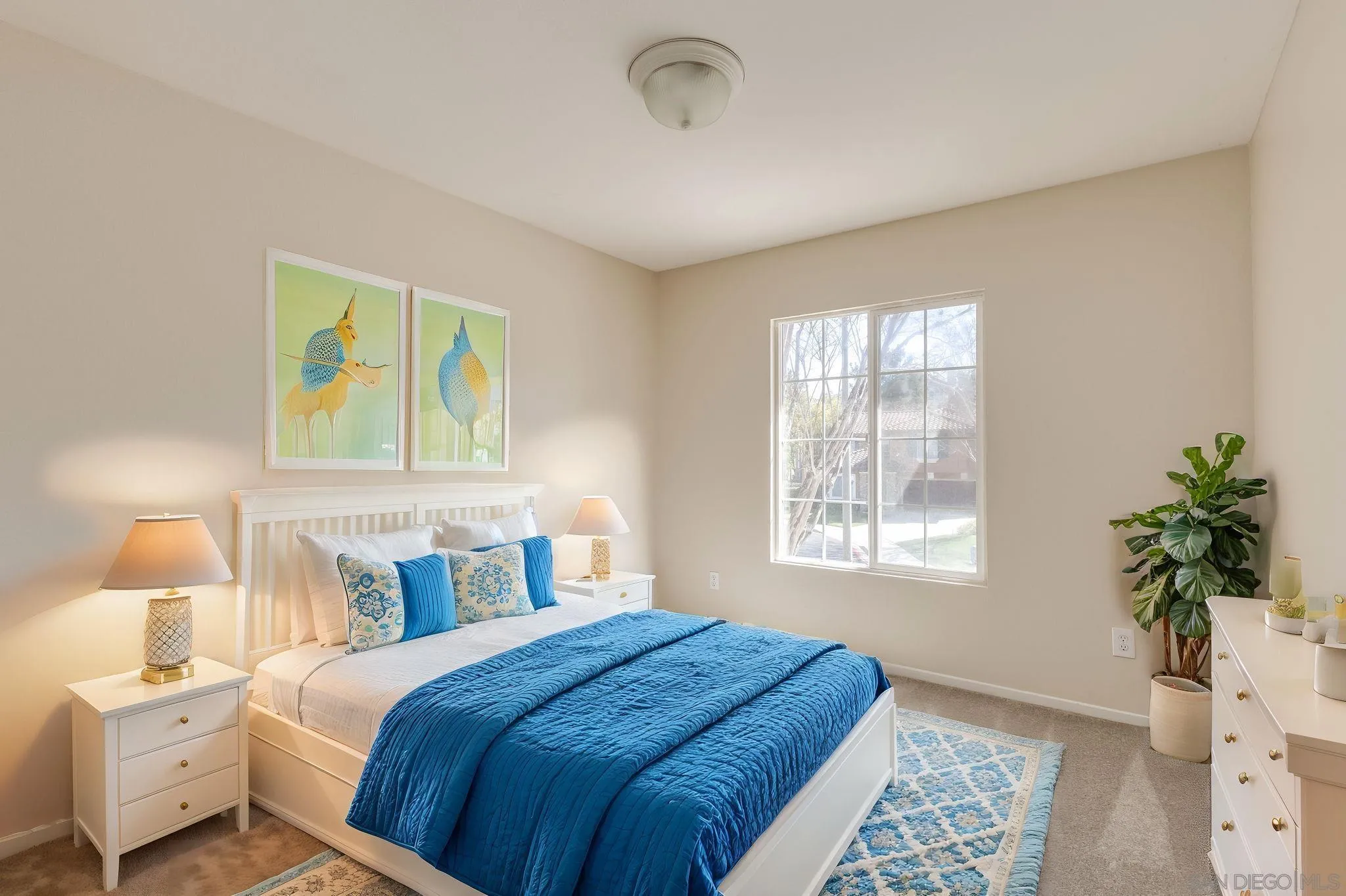 1589 Laurel Circle Vista, CA 92081 - Photo 22 of 31 a bedroom with bed and window