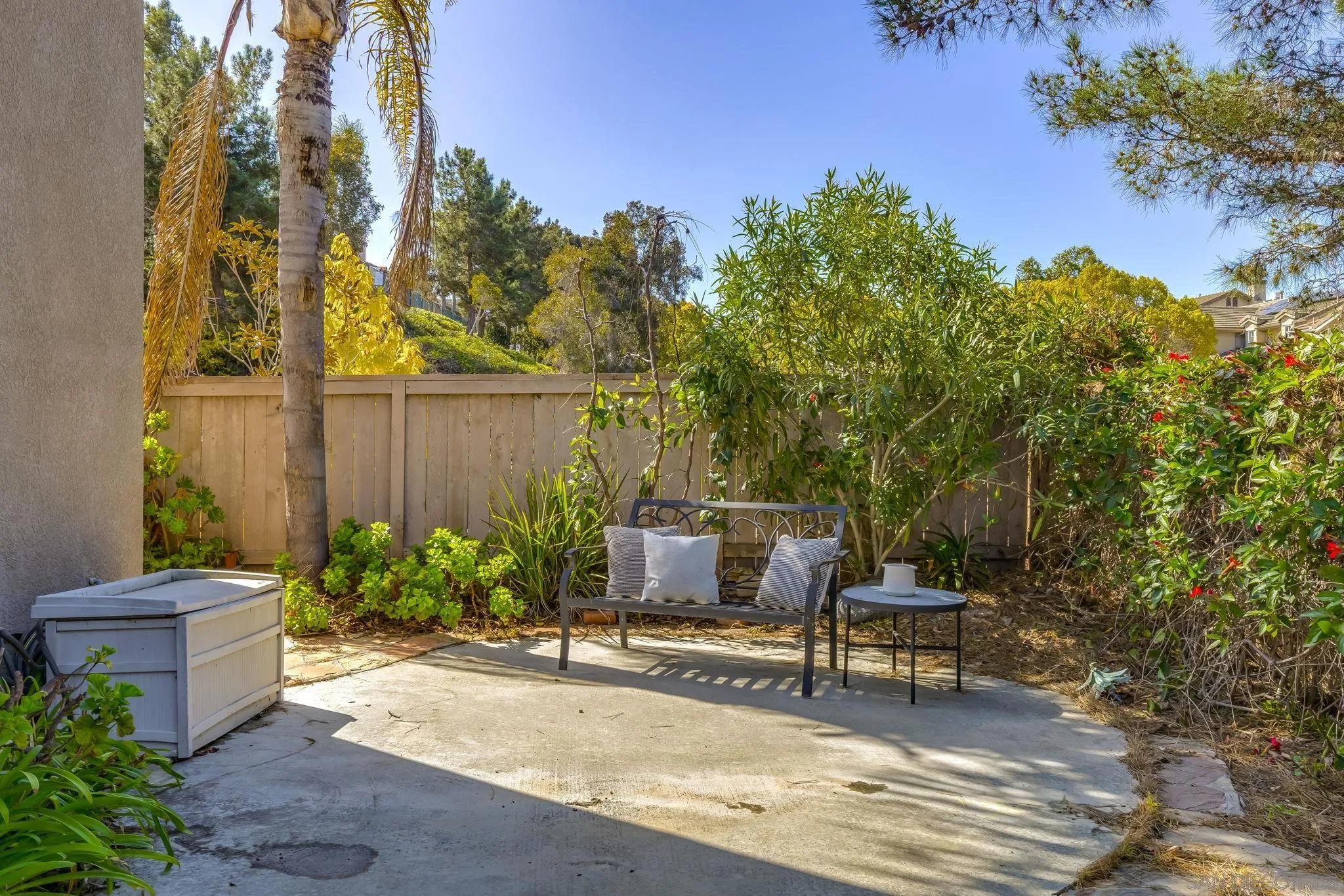 1589 Laurel Circle Vista, CA 92081 - Photo 25 of 31 a backyard of a house with table and chairs