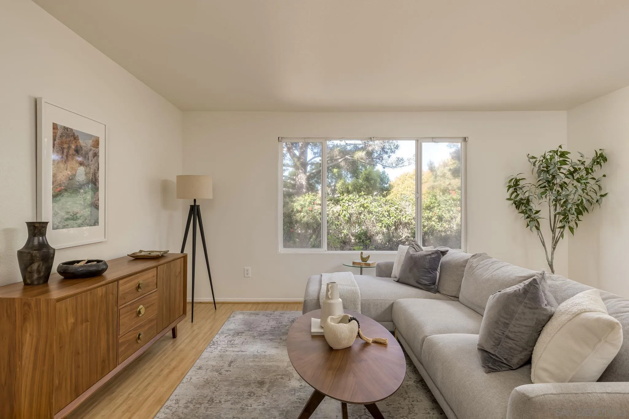 1589 Laurel Circle Vista, CA 92081 - Photo 5 of 31 a living room with furniture and a large window