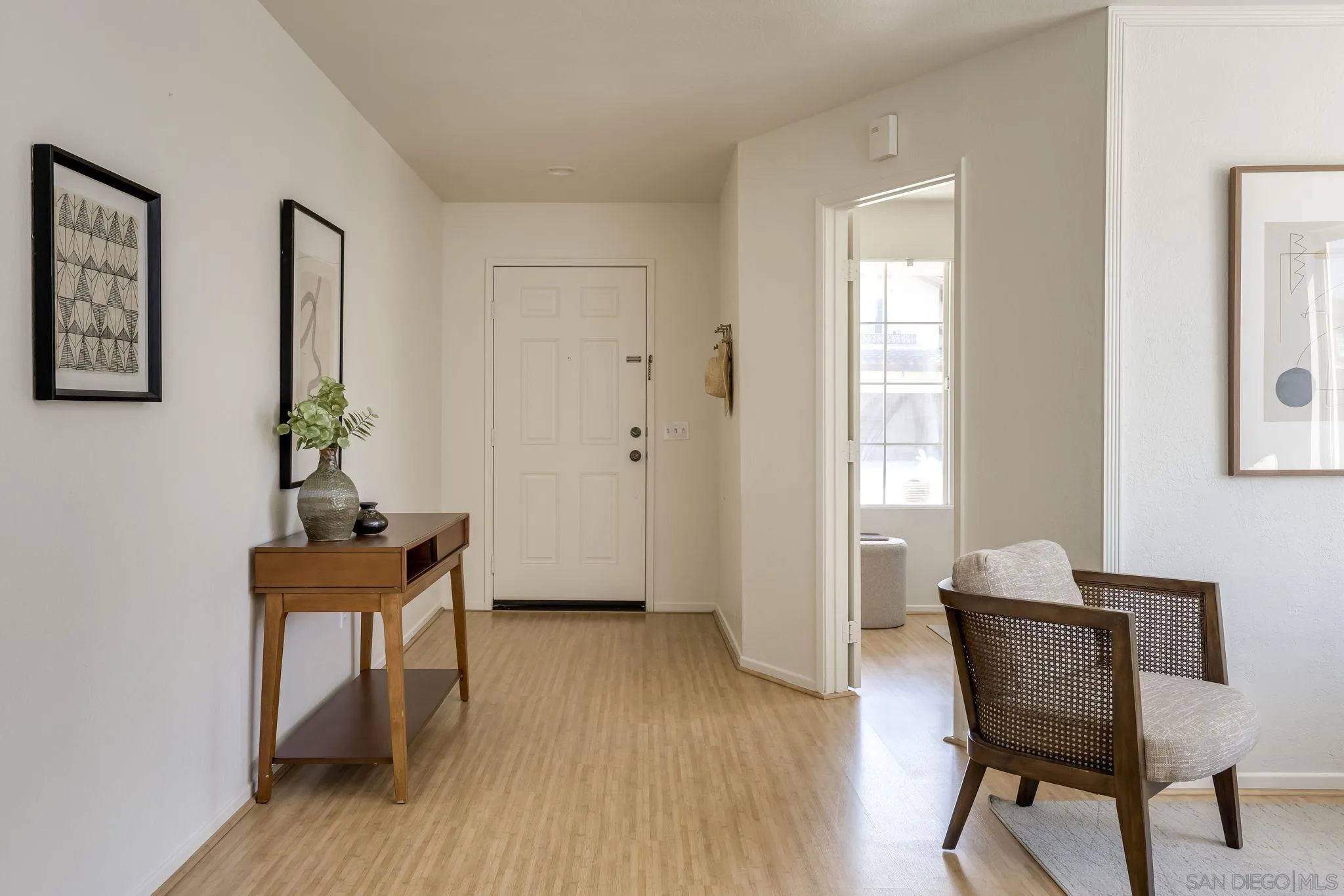 1589 Laurel Circle Vista, CA 92081 - Photo 10 of 31 a room with furniture and wooden floor