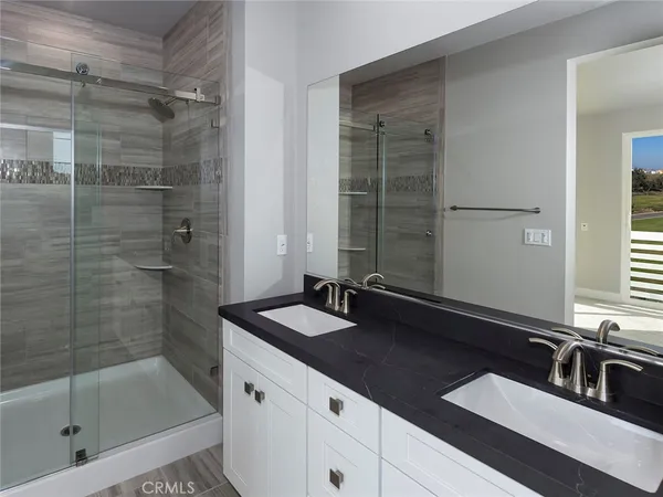 a bathroom with a bathtub and a sink