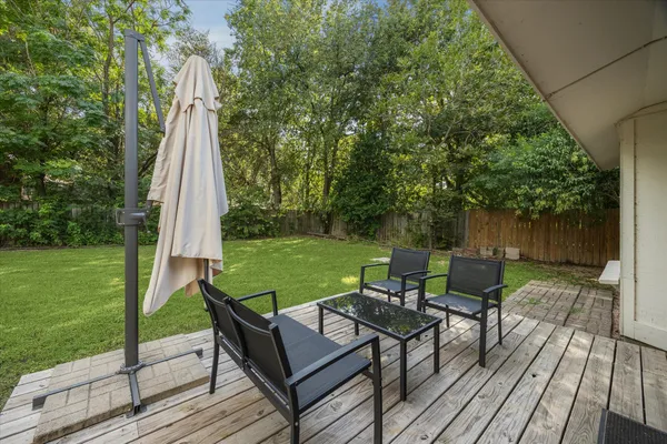 a view of a two chairs in the deck