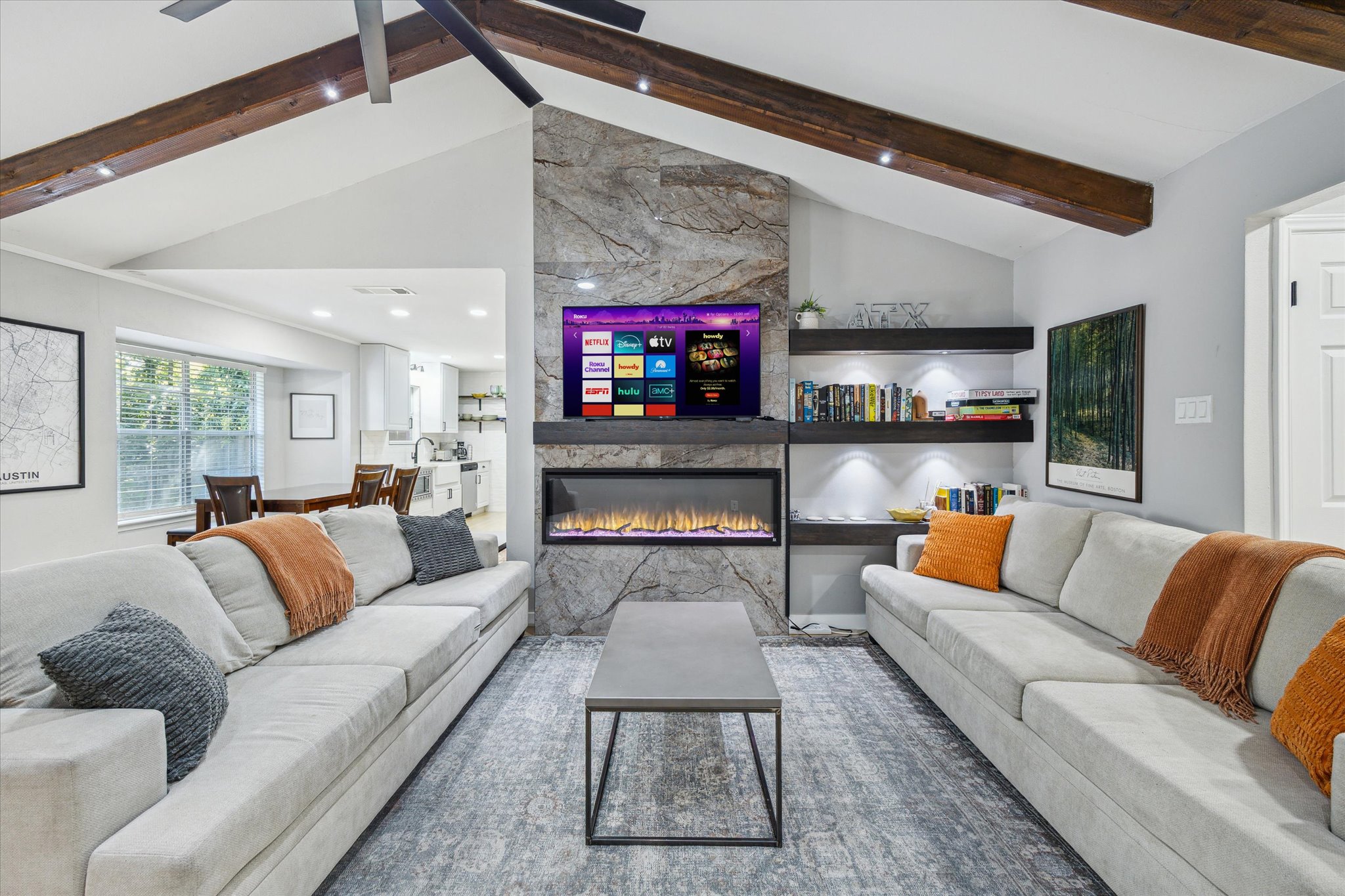 10414 Quail Ridge Drive Austin, TX 78758 - Photo 2 of 17 a living room with furniture and a fireplace