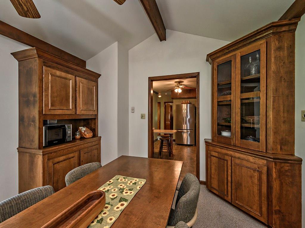413 Spring St Extension Mars, PA 16046 - Photo 13 of 22 Another View of The Dining Room, looking into the Kitchen. Heavy Solid Wood Built-Ins, offering Additional Storage.