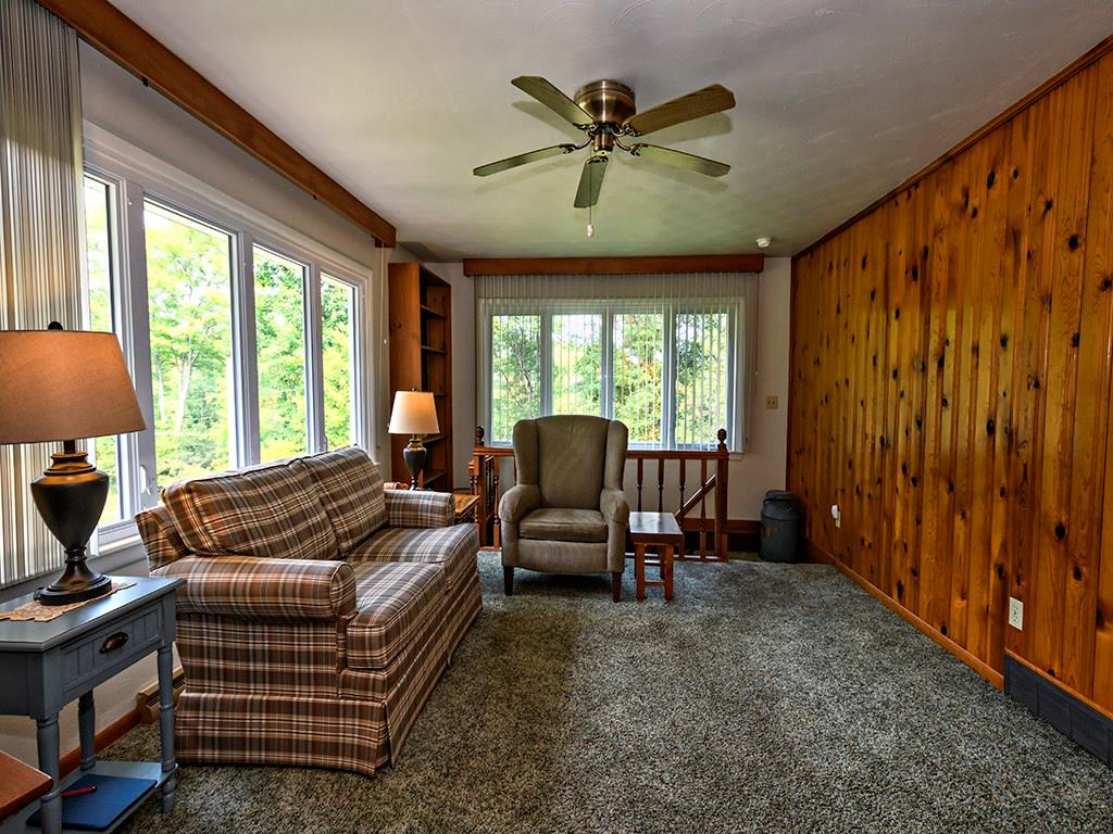 413 Spring St Extension Mars, PA 16046 - Photo 15 of 22 Living Room 13.9 Ft. X 12.6 Ft. Loads Of Light, Newer Windows throughout the Home. Hardwood Floors Under the Carpet! The Home has Central Air, but also has a Whole House Attic Fan in The Hallway.