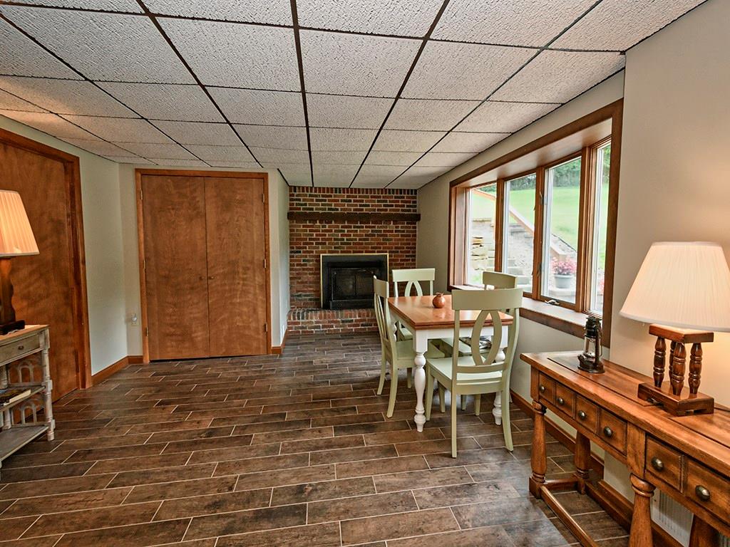 413 Spring St Extension Mars, PA 16046 - Photo 22 of 22 Another View of The Family Room. The Mechanicals are through the doors straight ahead. The door to the left will take you to The Full Bath, Laundry Room and Storage, and out the back door if you keep on going!