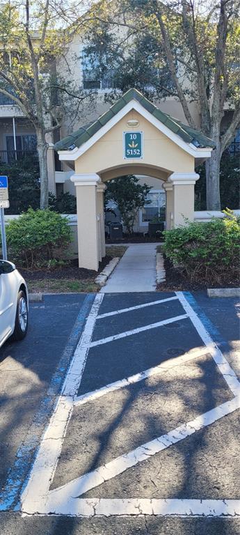 5152 Northridge Road, Unit 302 Sarasota, FL 34238 - Photo 1 of 1 a front view of a house with a yard