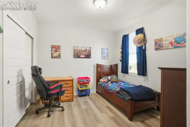 a bedroom with furniture and a bed