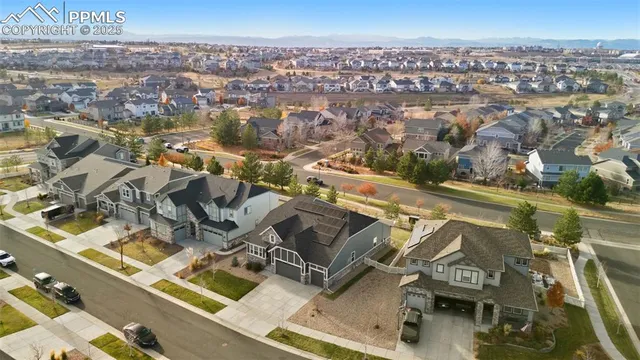 an aerial view of residential building and lake view