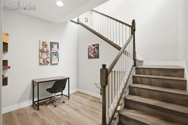 a view of entryway with wooden floor