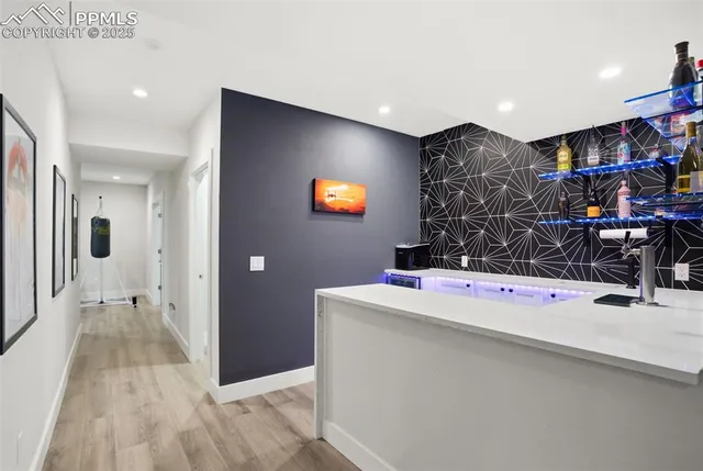 a room with furniture and mirror