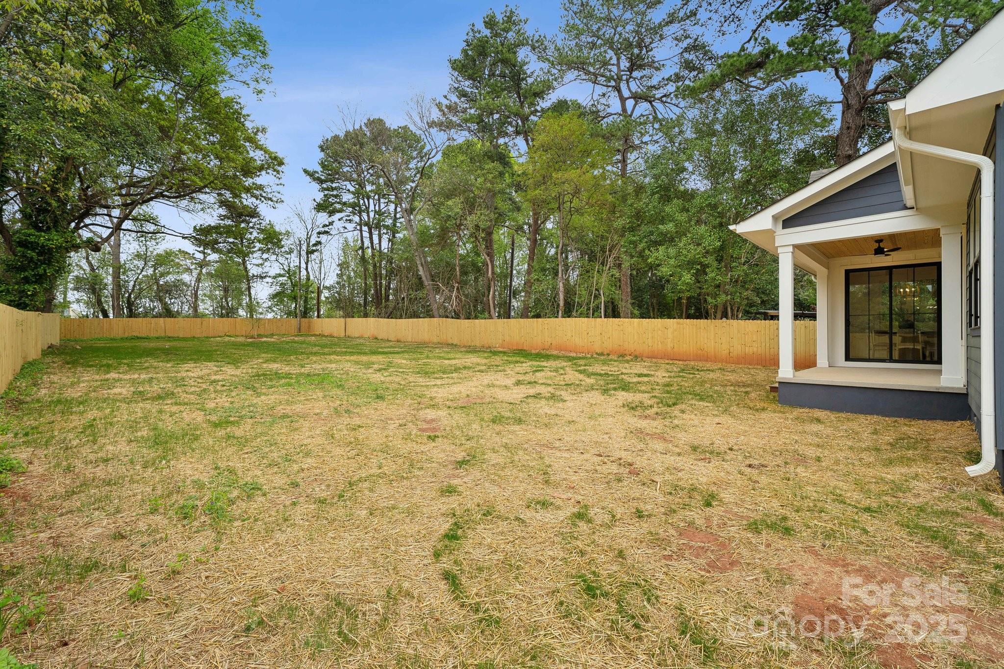 1210 Skyview Road Charlotte, NC 28208 - Photo 38 of 43 a view of big yard with an trees