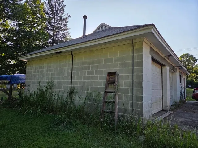 a backyard of a house with lots of green space