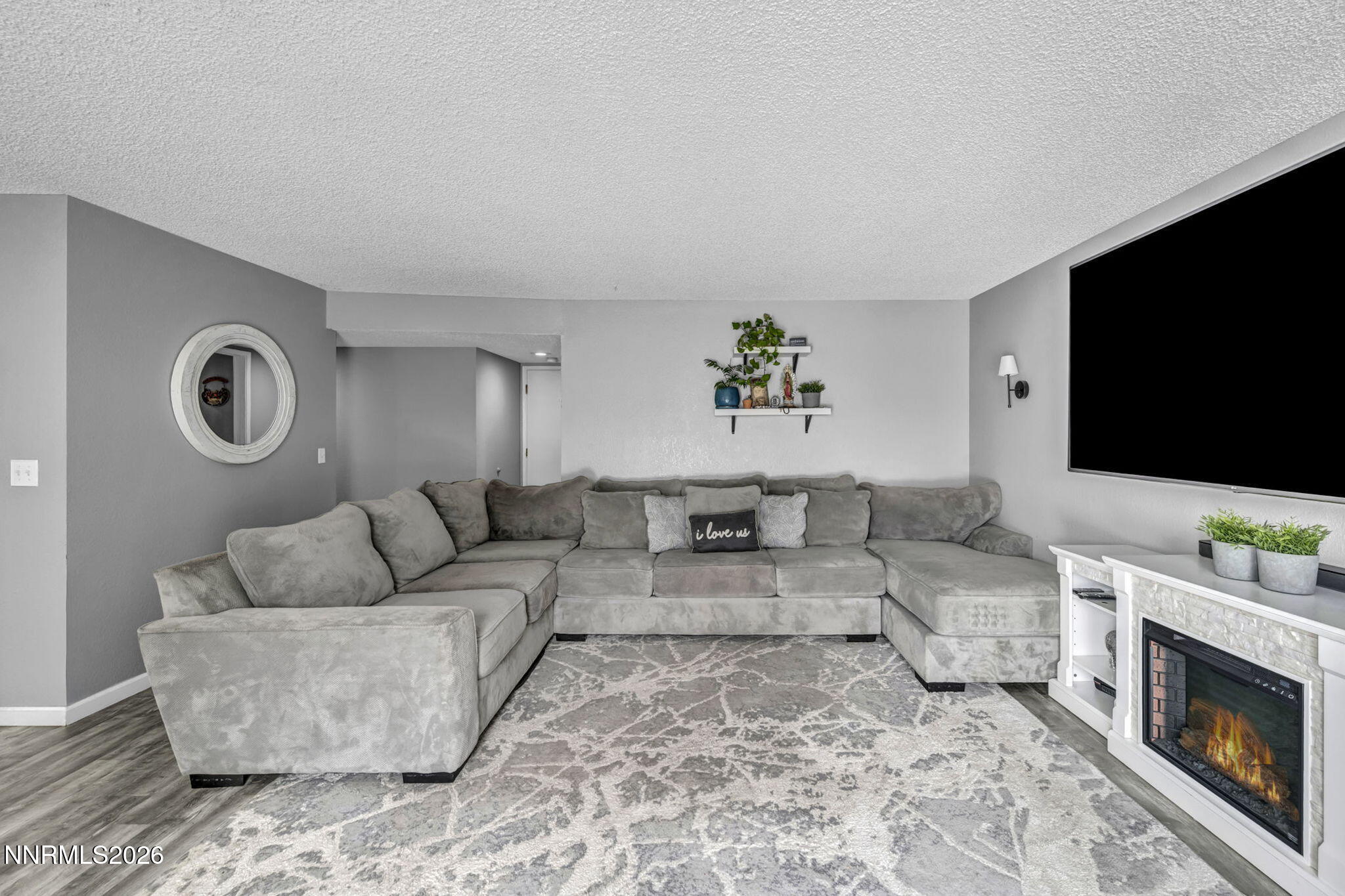 8655 Silver Shores Drive Reno, NV 89506 - Photo 16 of 42 a living room with furniture and a flat screen tv