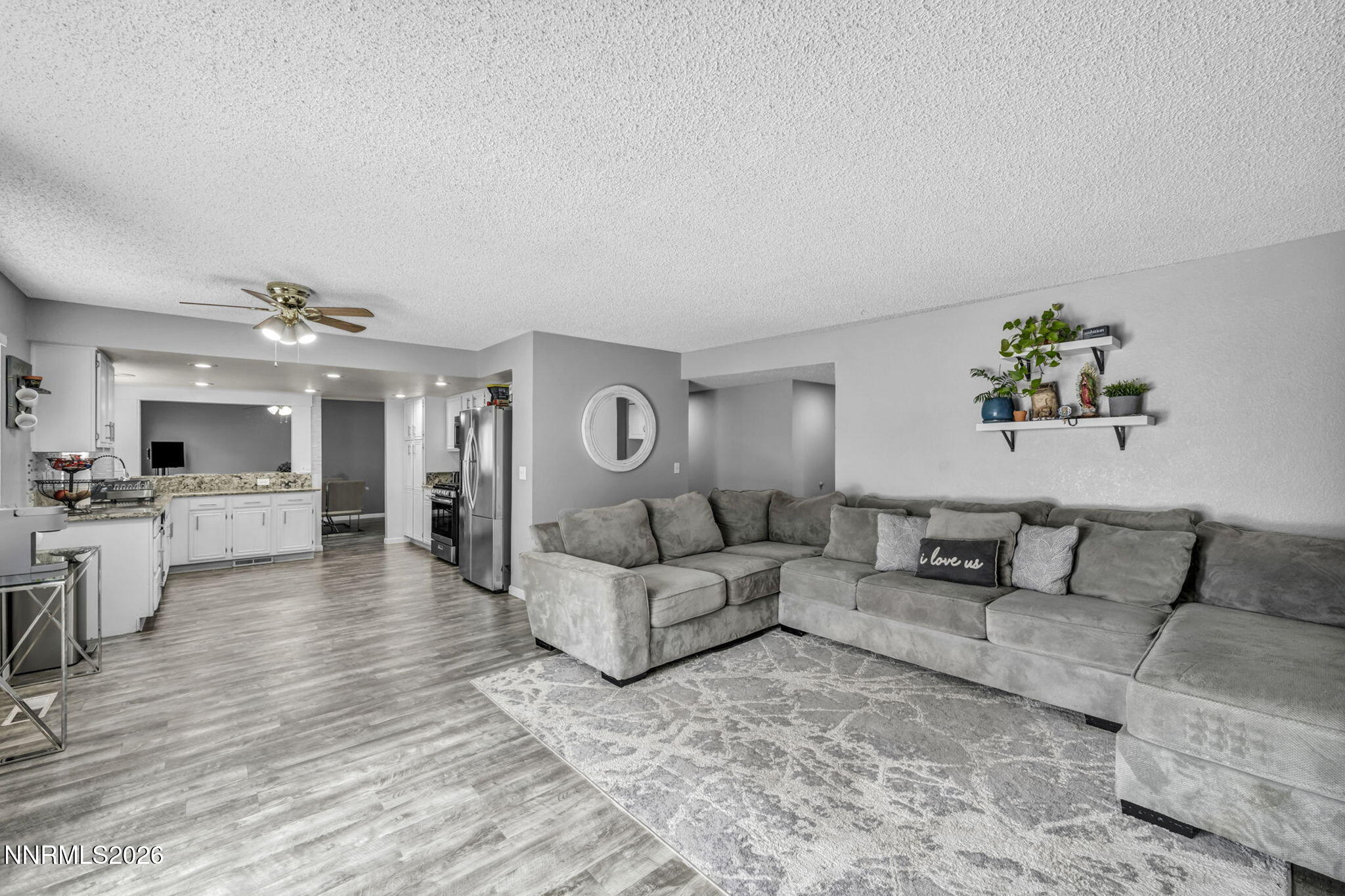 8655 Silver Shores Drive Reno, NV 89506 - Photo 17 of 42 a living room with furniture and a large window