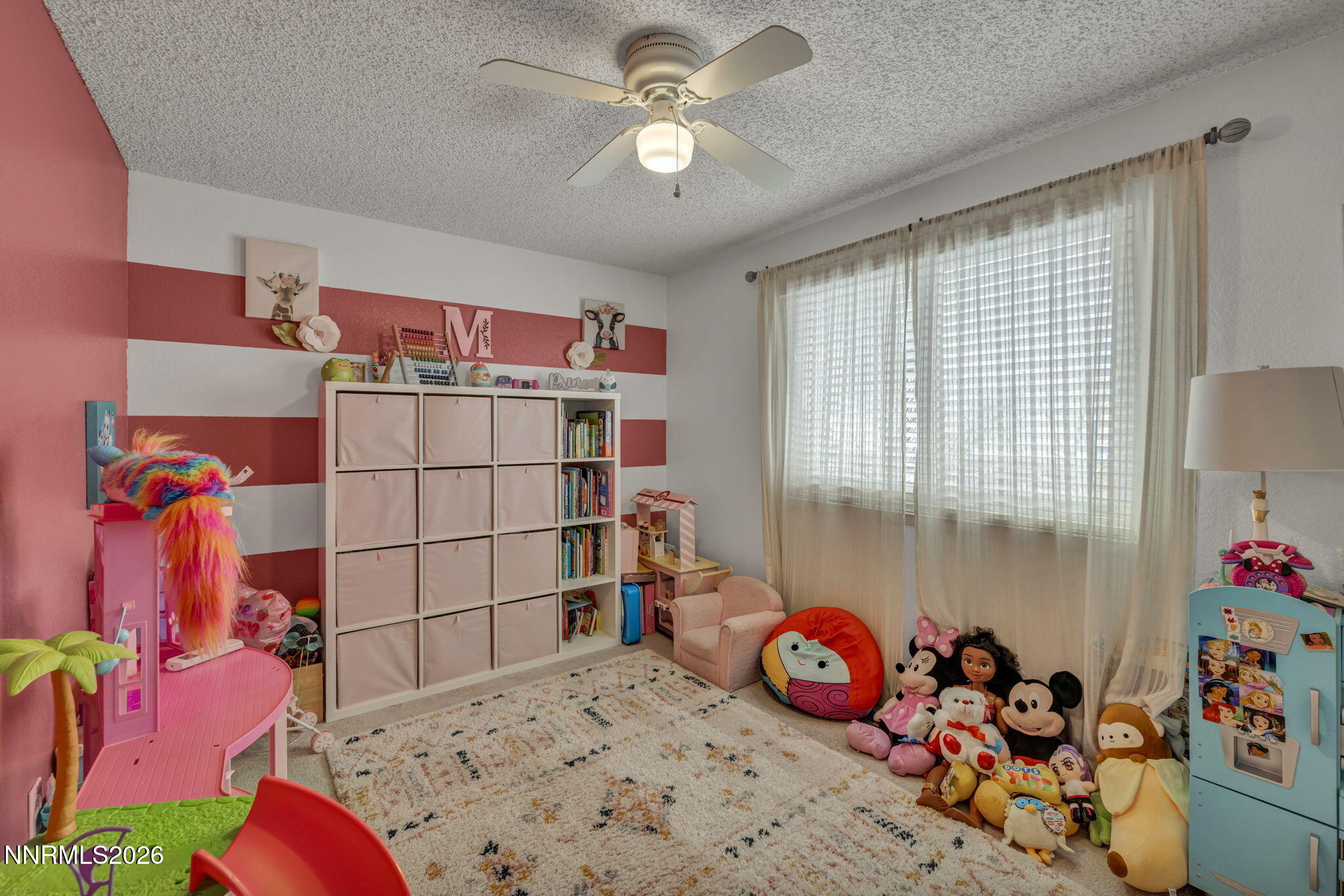 8655 Silver Shores Drive Reno, NV 89506 - Photo 26 of 42 a bedroom with a bed and a window