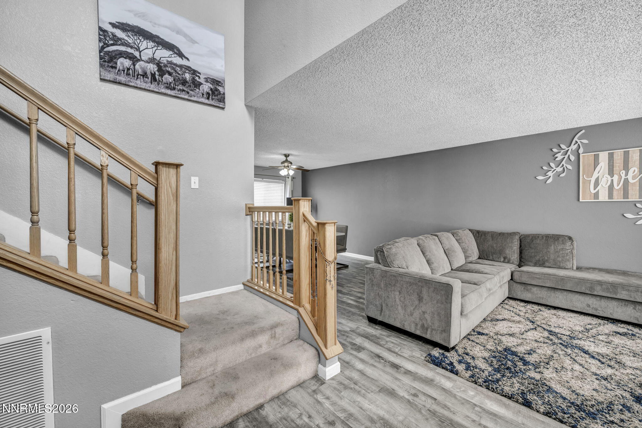 8655 Silver Shores Drive Reno, NV 89506 - Photo 3 of 42 a living room with furniture and a rug