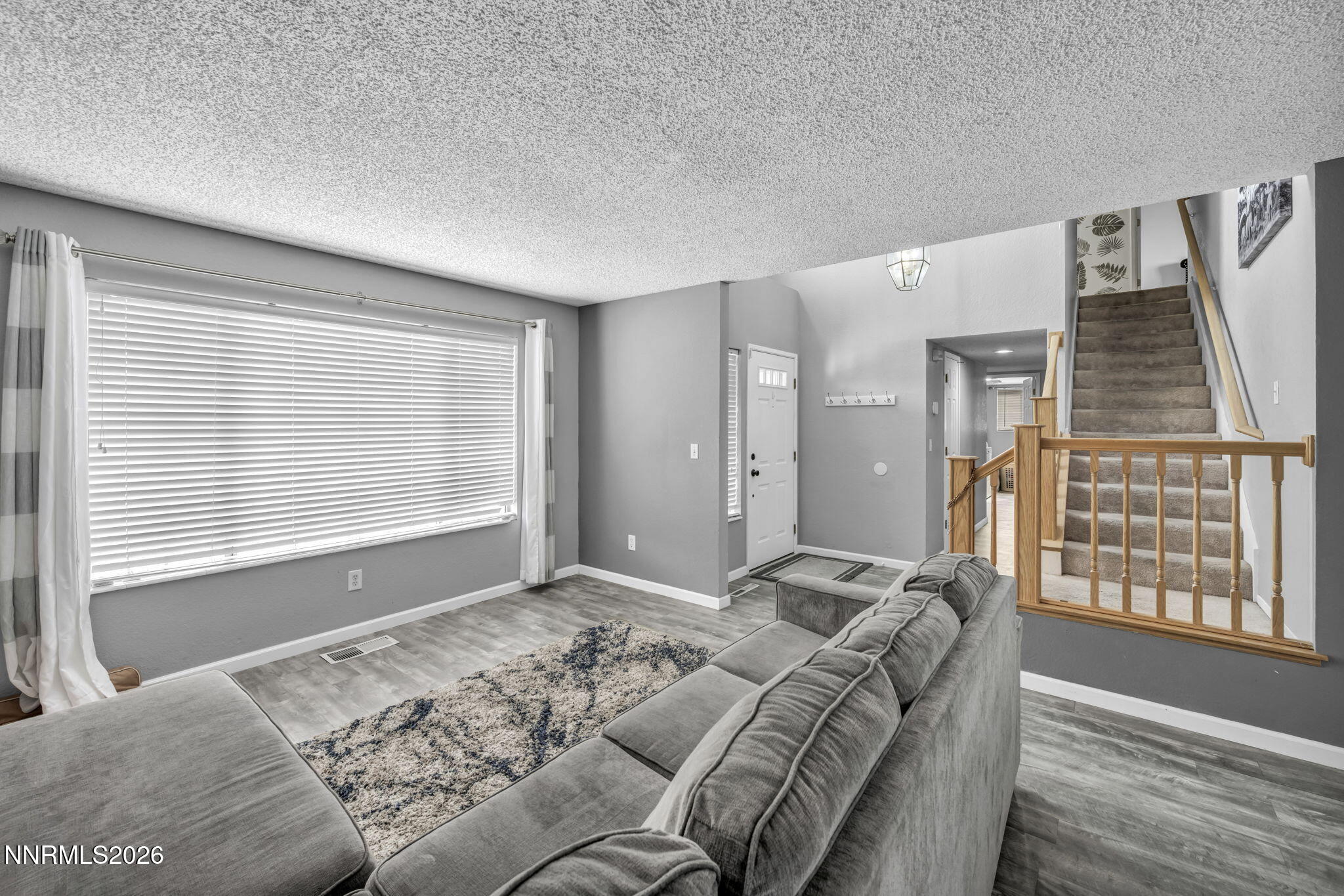 8655 Silver Shores Drive Reno, NV 89506 - Photo 5 of 42 a bed sitting in a bedroom next to a window