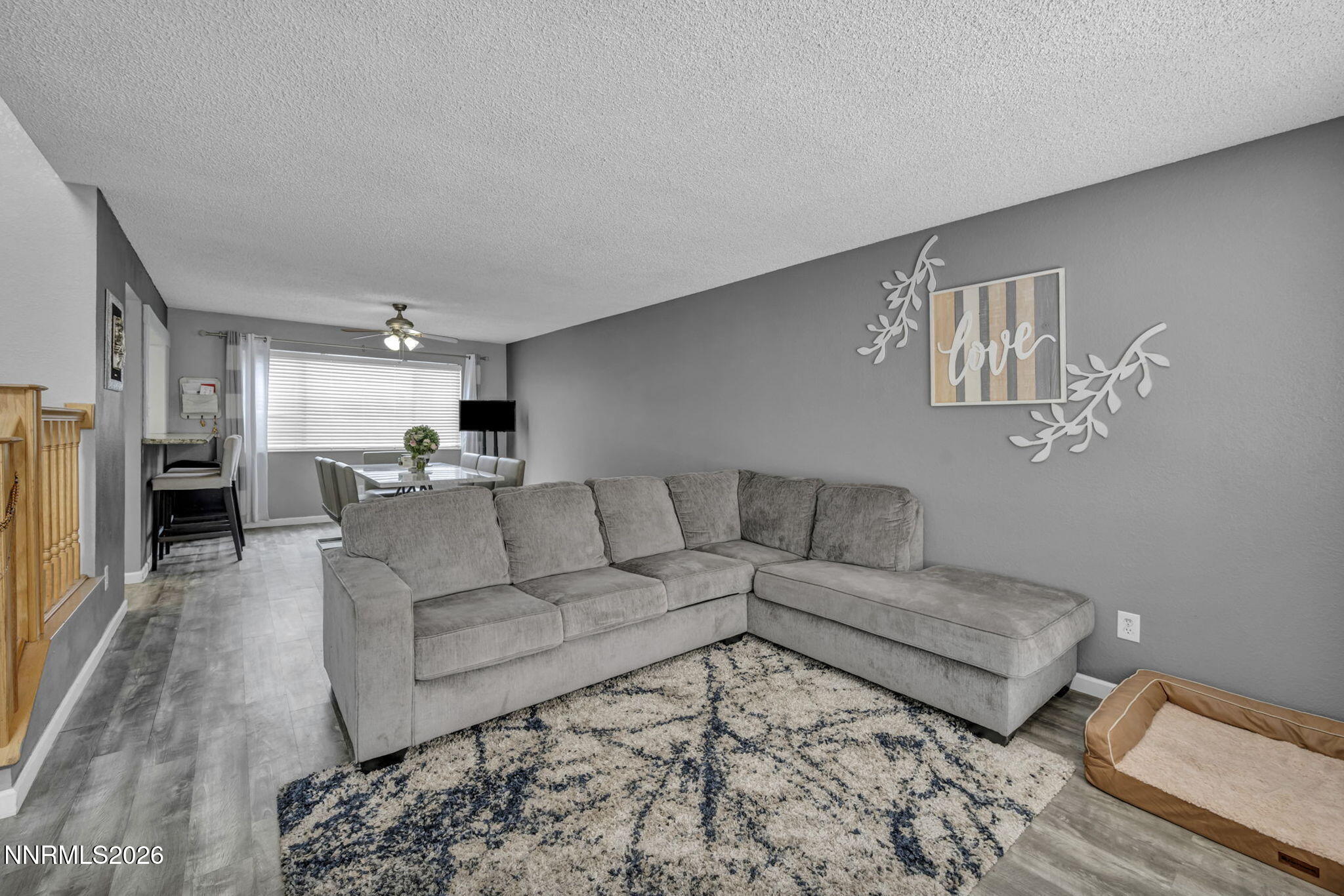 8655 Silver Shores Drive Reno, NV 89506 - Photo 6 of 42 a living room with furniture and a rug