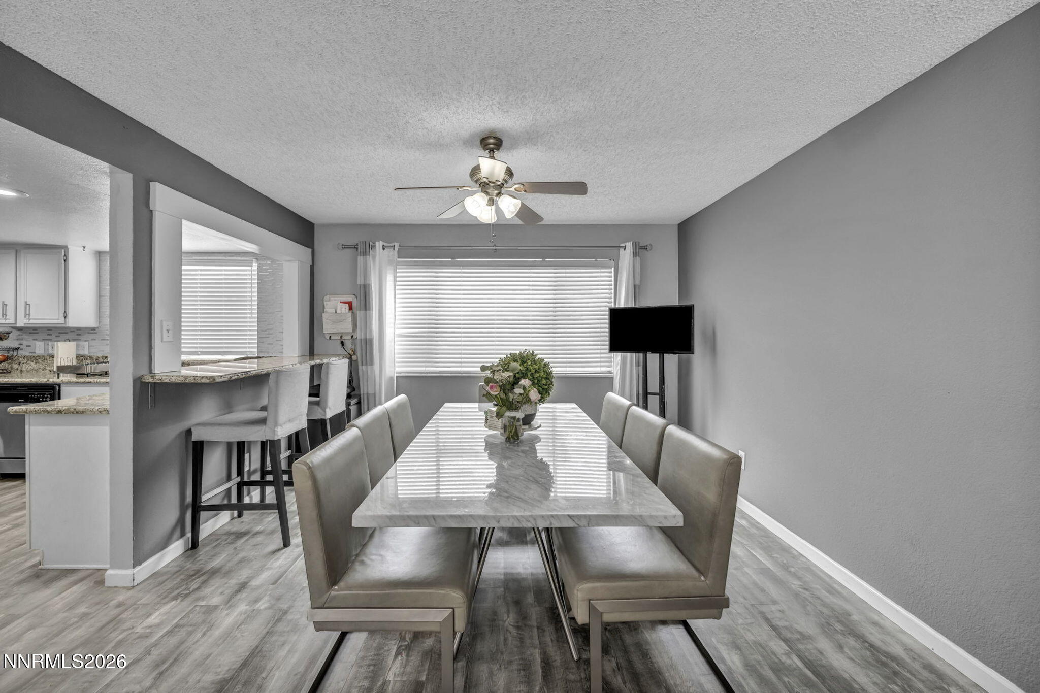 8655 Silver Shores Drive Reno, NV 89506 - Photo 7 of 42 a view of a dining room with furniture window and wooden floor