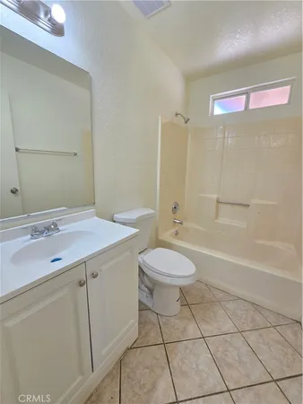 a bathroom with a shower and a toilet