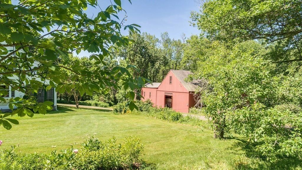 43 Brooks Station Road Princeton, MA 01541 - Photo 5 of 30 a view of a big yard with large tree and plants